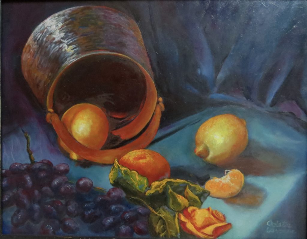 An oil painting of a brass pot surrounded by various fruit such as grapes and oranges.